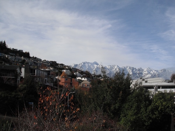 The view from Taylor's back balcony, facing the snow-covered Remarkables mountain range.