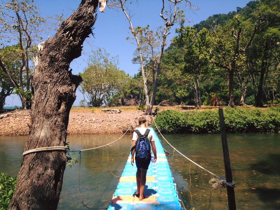 Lex crosses a bridge on Koh Tarutao.