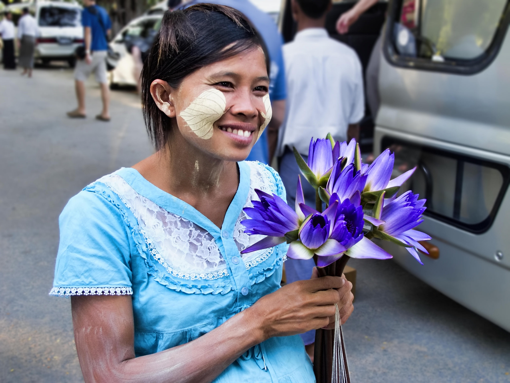 A woman with thanaka.